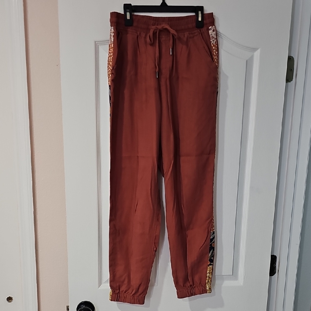 5/$28 Stylish Rust Joggers with Patterned Accents
